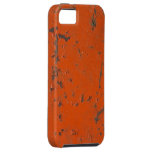 Flaky, scratched red paint. Faux rust and grunge casemate cases