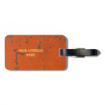 Flaky, scratched red paint. Faux rust and grunge luggage tags