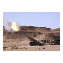 Flame and smoke emerge from the muzzle