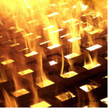 Flames of fire through a lattice photograph design cut out