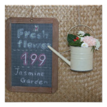 Flowers in watering can photo
