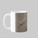 Footprints on the beach mugs