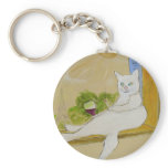 Frenchy looking at Eiffel tower keychains