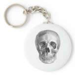 Frontal view drawing of a human skull keychains