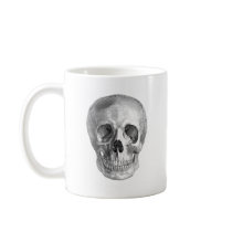 Frontal view drawing of a human skull coffee mug