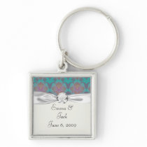 funky turquoise and magenta damask key chain