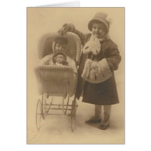 girl and her doll in carriage greeting card