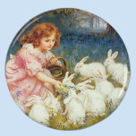 Girl feeding Rabbits magnets
