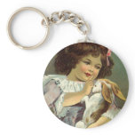 Girl Holding an Easter Bunny; Easter Greetings keychains