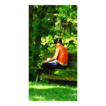 Girl Reading in Park Picture Card