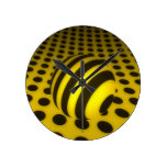 Glowing sphere on spots round wallclock