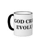 GOD CREATED EVOLUTION mugs