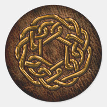 Golden celtic ornament on leather round sticker