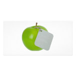 Green apple with metal tag photo cards
