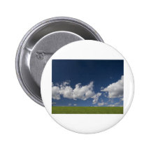 green filed, blue sky, white cloud pinback buttons