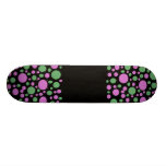 green pink and black skateboards