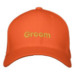 Groom baseball cap in orange with light font. embroidered hats