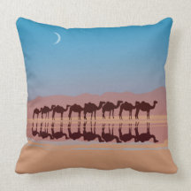 Group of camels walking in sahara pillow