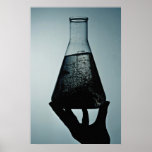 Hand holding an attractive laboratory beaker print