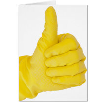 Hand in yellow latex glove cards