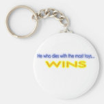 He Who Dies With The Most Toys Wins Key Chain