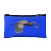 heron in flight with fish makeup bag