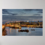 HMS Belfast at night in London England posters