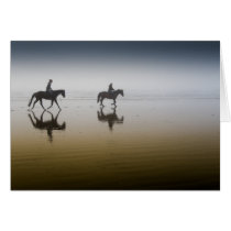 Horse riders at the beach greeting cards