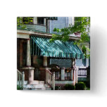 House With Green Striped Awning buttons
