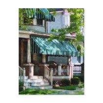 House With Green Striped Awning