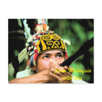 Iban Warrior with blowpipe