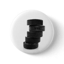 Ice hockey pucks... button