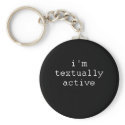 I'M TEXTUALLY ACTIVE keychains