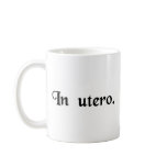 In the womb. mugs