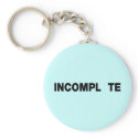 INCOMPL TE keychains