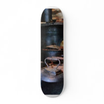 Irons Heating on Stove Skate Board