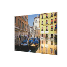 Italy, Venice, gondolas moored along canal Gallery Wrapped Canvas