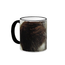 Kitten asleep on White Comforter Mug