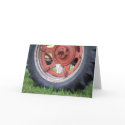 Kitten playing on a tractor cards