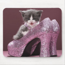 Kitten sitting in glitter shoes mousepad