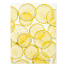 Lemon slices arranged in pattern backlit post card