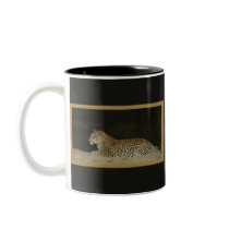 Leopard lying on sand bank wildlife mugs