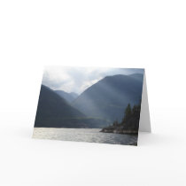 Light Shines Through the Clouds Greeting Card
