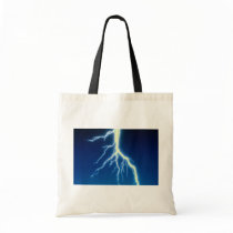 Lightning bolt over blue background bag