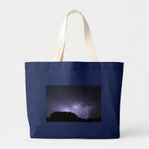 Lightning storm on purple sky canvas bag
