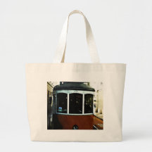 Lisbon tram closeup bags