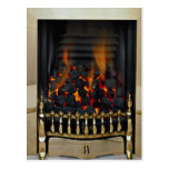 Lit coal in brass basket post card