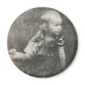 little baby on grass magnet