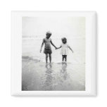 Little boy and girl holding hands magnet