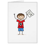 Little boy with A plus grade cards